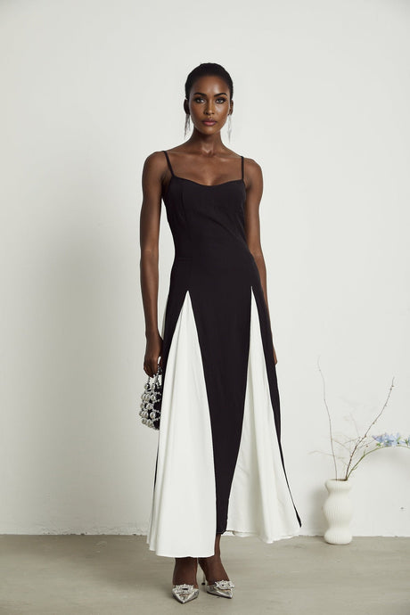 A long flowing plissé maxi dress named Sofie featuring contrasting colors