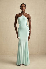 A long flowy maxi dress with ruffle details and a butterfly pattern named Amelie