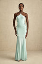 A long flowy maxi dress with ruffle details and a butterfly pattern named Amelie