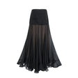 A long flowy maxi skirt with ruffle details and pleated tulle fabric in a soft rayon material