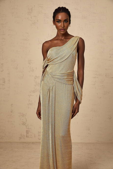 A long gold maxi dress with a gathered design and ribbon details named Anne