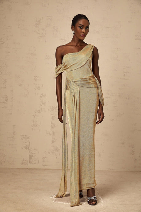 A long gold maxi dress with a gathered design and ribbon details