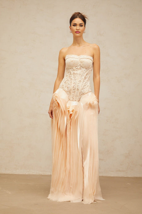 A long maxi dress featuring a layered corset top with lace detailing in neutral tones named Irene