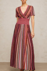 A long maxi dress with a multicolor metallic knit pattern featuring various bright hues in a shimmering fabric