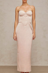 A long pink satin maxi dress with an offshoulder neckline and corsetstyle bodice