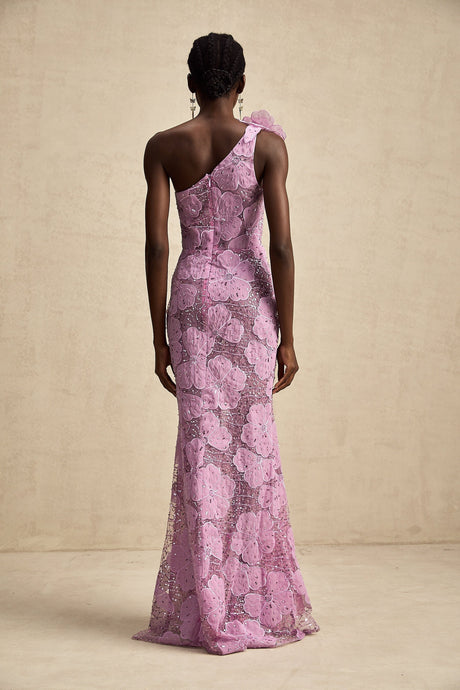 A long purple maxi dress with floral applique detailing named Beatrice