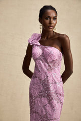 A long purple maxi dress with floral applique details