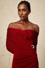 A long red velvet maxi dress with ruched detailing and a fitted silhouette named Helene