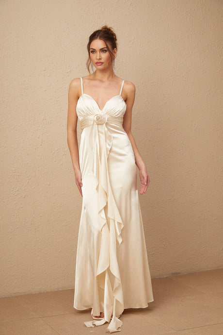 A long satin maxi dress with a corset bodice featuring floral applique detailing in a feminine Filomena style