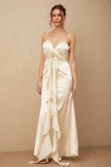 A long satin maxi dress with a corset bodice featuring floral applique details and a floral pattern throughout the fabric