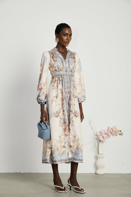 A long sleeve boho style dress with a floral print pattern called Camille