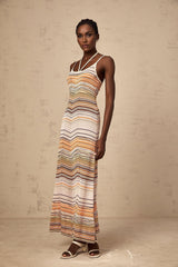 A long striped maxi dress in multiple colors featuring a knit texture by Chloe