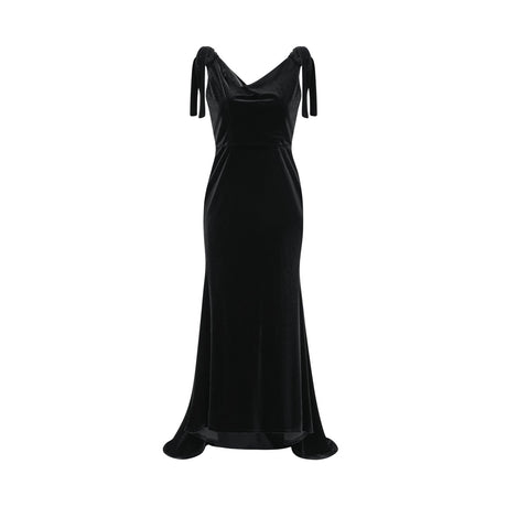 A long velvet maxi dress in dark color with embellishments and an open back design named Audrey
