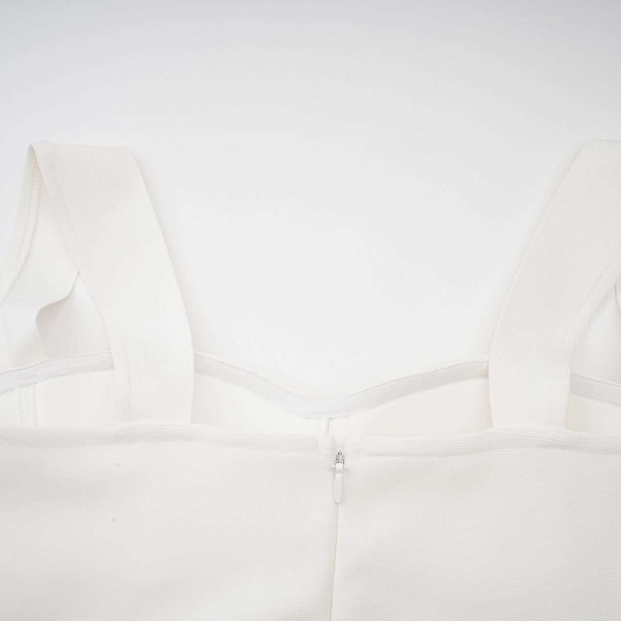 A long white bandage maxi dress with floral applique details named Olivia