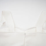 A long white bandage maxi dress with floral applique details named Olivia
