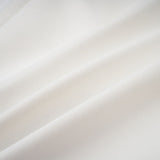 A long white bandage style maxi dress with floral applique details named Olivia