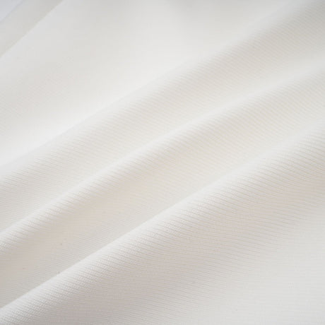 A long white bandage style maxi dress with floral applique details named Olivia