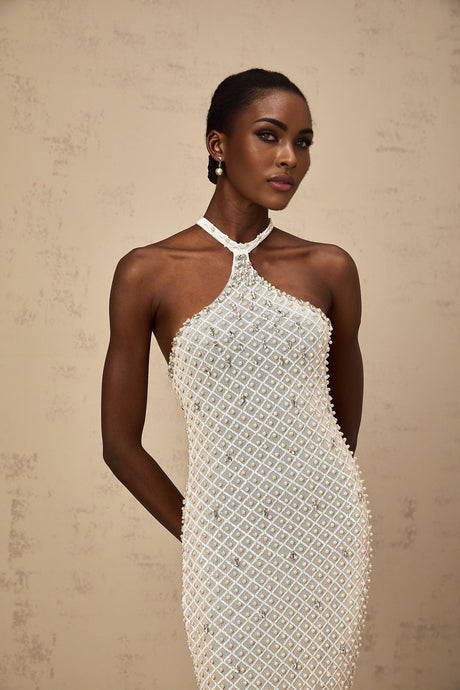 A long white halterneck maxi dress with embellishments named Claudine