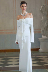 A long white knit maxi dress with glittery floral applique details named Wanda