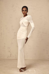 A long white maxi dress with ruched tulle detailing and a flowy silhouette named Veronique