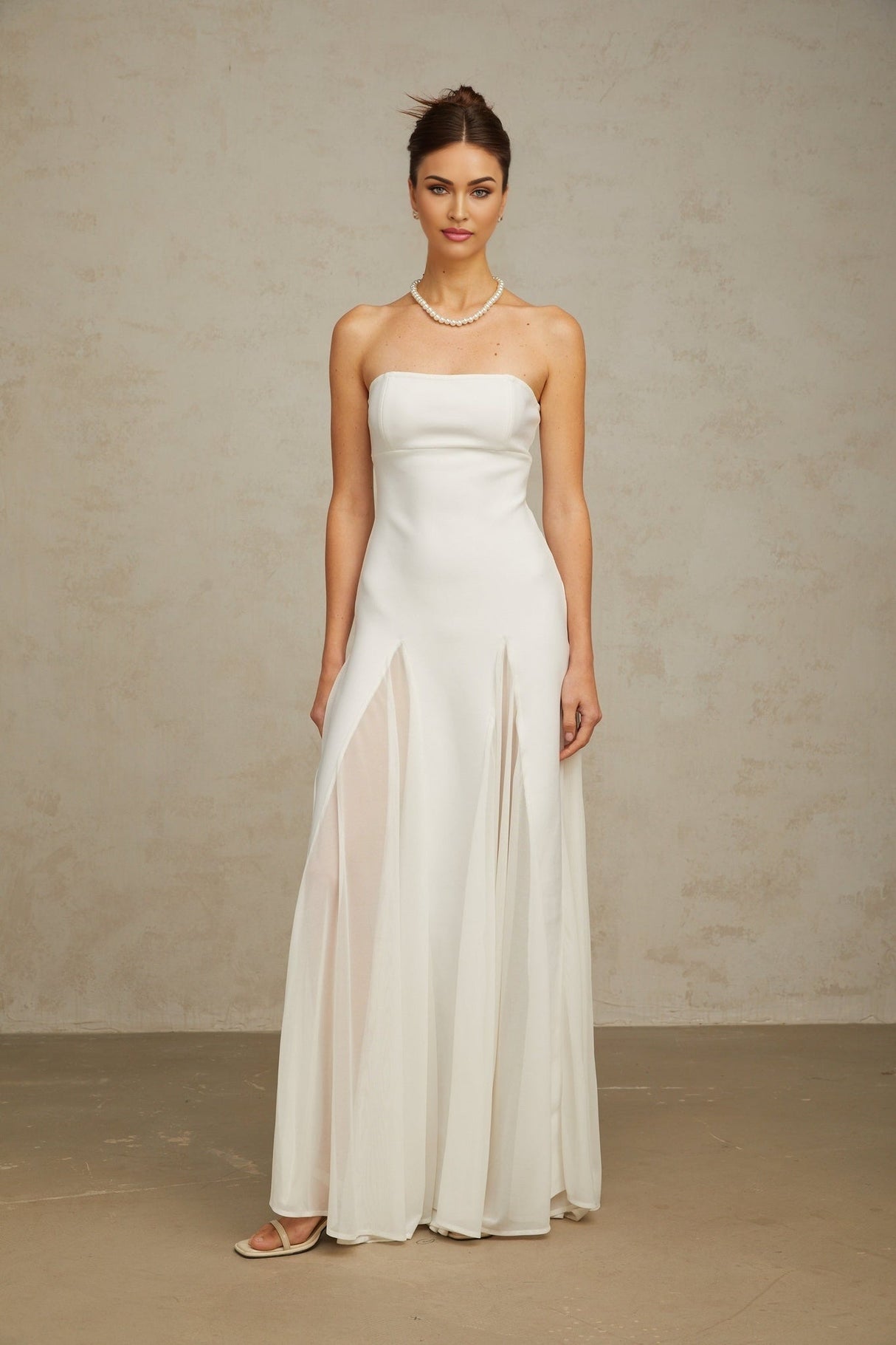 A long white maxi dress with tulle panelling details named Nathalie
