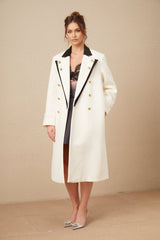 A long wool blazer with colorblocked design featuring a doublebreasted front in shades of terracotta and beige