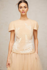 A matching set consisting of a tulle top and skirt decorated with floral applique designs named Ludivine