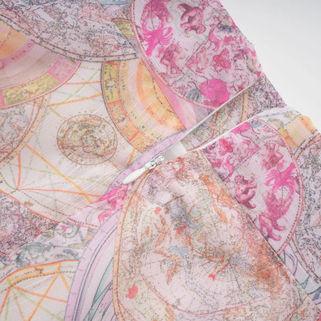 A matching set featuring a cherry pink shirt and skirt with a pattern print design