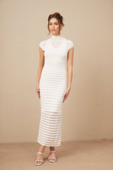 A midi dress with horizontal stripes in tulle fabric featuring a design inspired by the Josephine collection