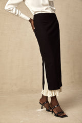 A midi skirt featuring colorblocked panels in a contemporary design named Heloise