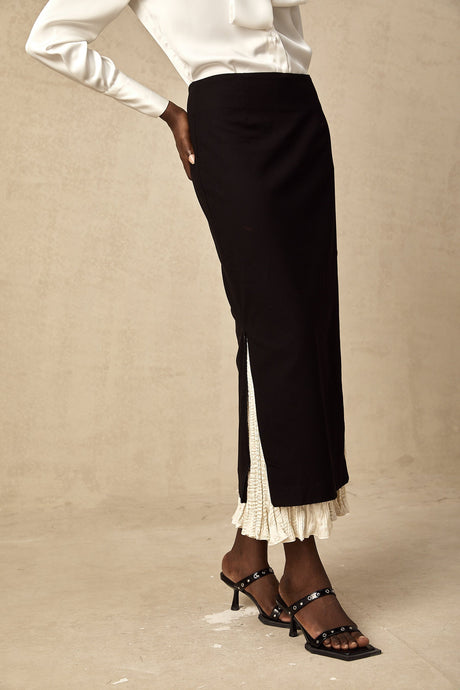 A midi skirt featuring colorblocked panels in a contemporary design named Heloise