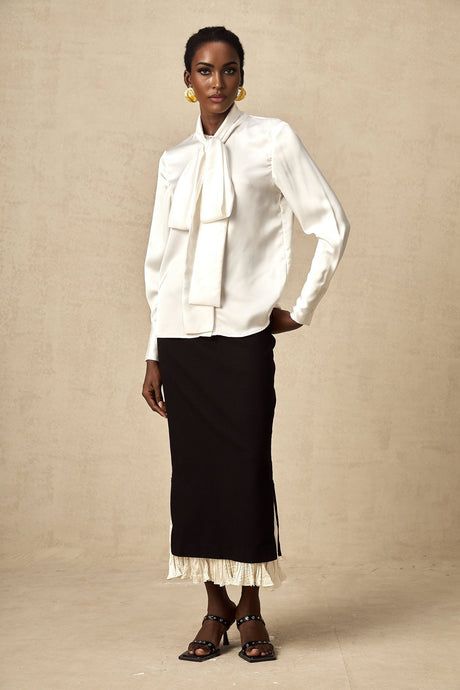 A midi skirt with colorblocked panels featuring a combination of different colors in a geometric pattern