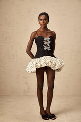 A mini dress with color blocking featuring a bowknot detail and polka dot pattern named Berengere