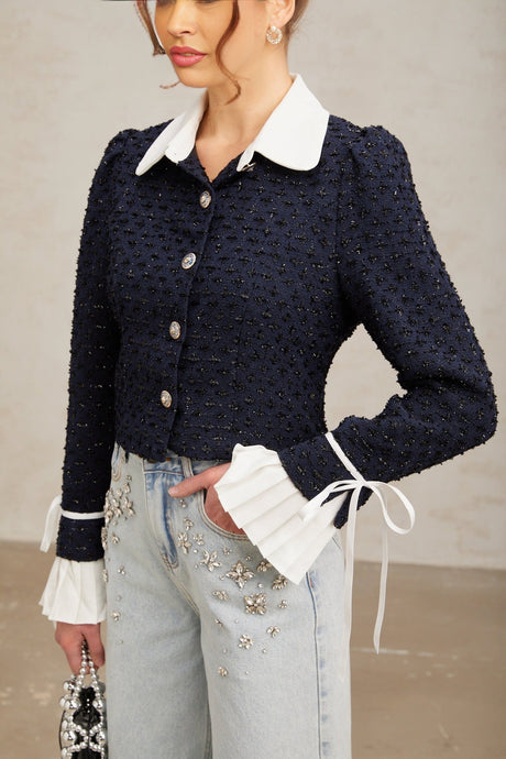 A navy blue tweed jacket with panelled design details named Doriane