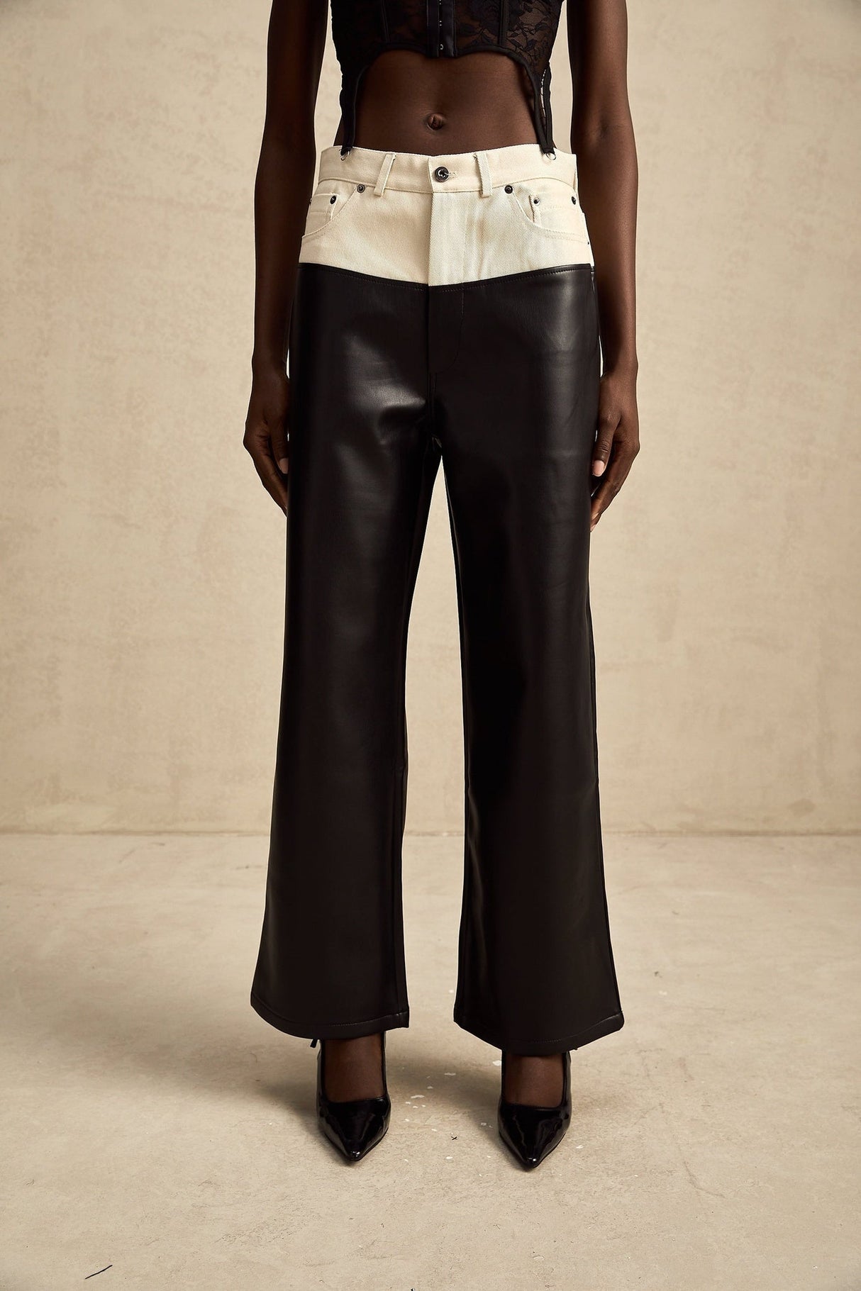 A pair of leather trousers with contrasting color details named Clotilde