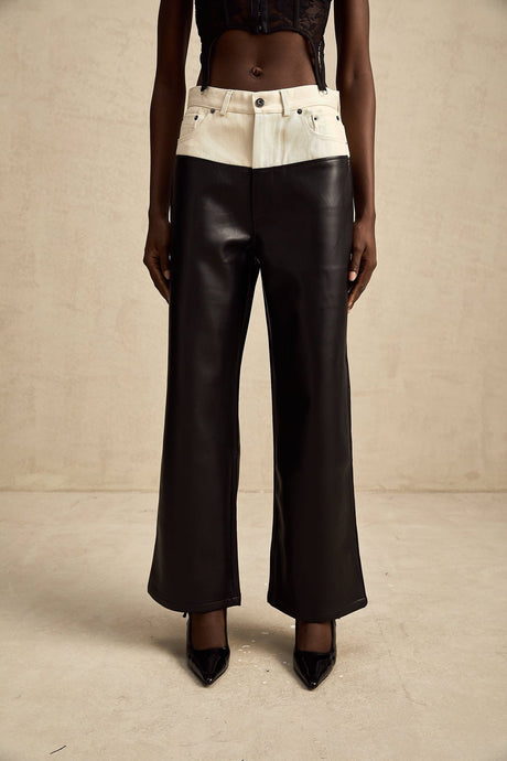 A pair of leather trousers with contrasting color details named Clotilde