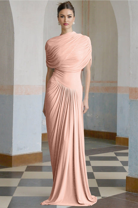 A pink asymmetric maxi dress with pleated details and a long flowing skirt worn by a female model