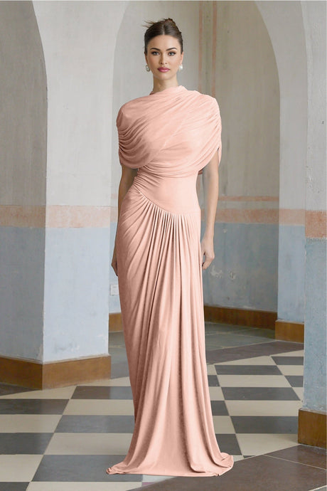 A pink asymmetric maxi dress with pleated details worn by a model standing against a plain background
