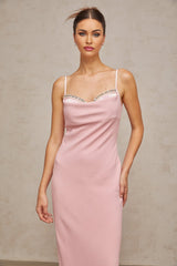A pink midi dress with a corsetstyle bodice adorned with crystal embellishments featuring a fitted silhouette and feminine design