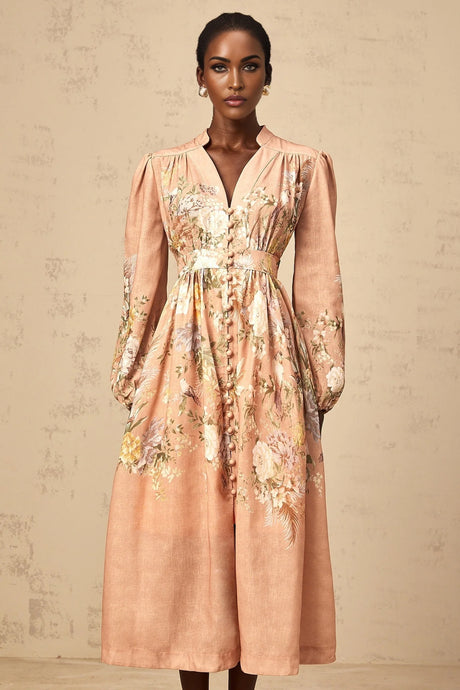 A pink midi dress with a floral print pattern and Vneckline called Sidonie