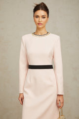 A pink midi dress with crystal embellishments and colorblocked design featuring the name Anais