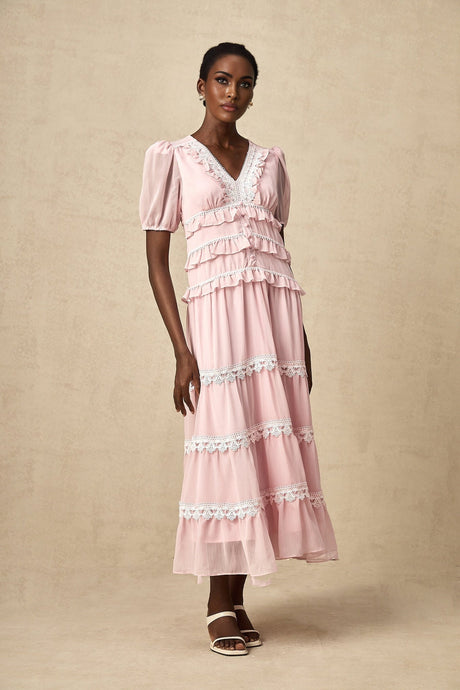 A pink midi dress with ruffled tiers and a feminine silhouette named Amelie