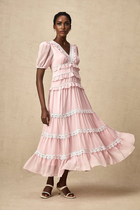 A pink midi dress with ruffled tiers and a feminine silhouette named Amelie