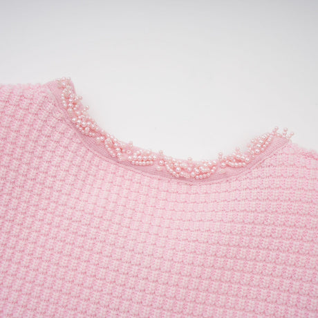 A pink mini dress with a knit texture and beaded embellishments named Eugenie