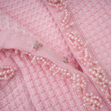 A pink mini dress with a knit texture featuring beaded embellishments named Eugenie