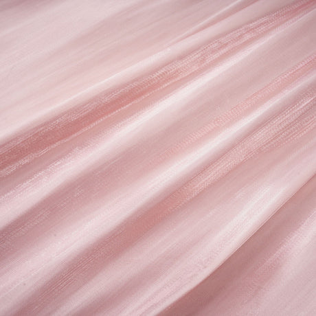 A pink mini dress with a pleated skirt and embellished details named Helena