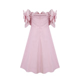 A pink offshoulder midi dress featuring 3D petal details named Juliette