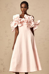 A pink offshoulder midi dress with 3D petal details named Juliette The dress features a fitted bodice and flared skirt with delicate floral embellishments