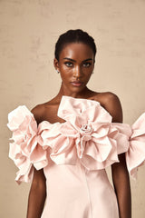 A pink offshoulder midi dress with 3D petal details named Juliette
