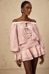 A pink offshoulder mini dress with a bow detail and flounced design named Dulcie